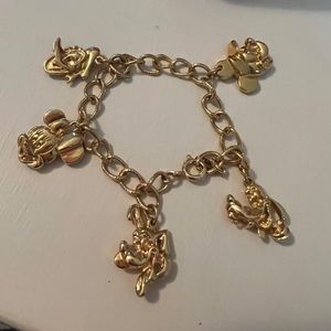 Vintage Disney charm bracelet and clip earrings